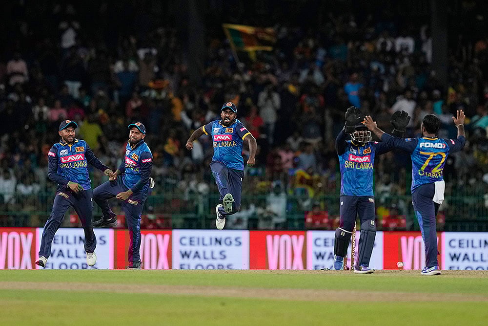 Sri Lankan players celebrate their win over India in 2nd ODI cricket - | Photo: AP/Eranga Jayawardena
